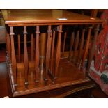 An Edwardian walnut table top revolving bookcase, width 39cm