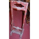 A Chinese red lacquered gong stand (only), width 38cm