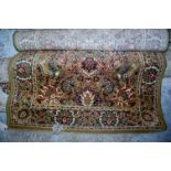 Two Persian style machine woven rugs