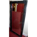 A contemporary black painted bevelled rectangular wall mirror, 166x80cm