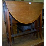 An Edwardian mahogany and satinwood Sutherland table, together with a further Victorian walnut