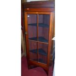 An Edwardian walnut corner cabinet, height 172cm