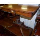 A Regency mahogany fold-over revolving card table on reeded supports, width 91cm