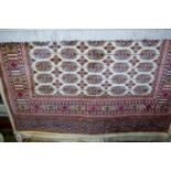 A modern Persian cream ground Bokhara carpet, 190x140cm