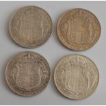 Great Britain, four George V half crowns, dated 1913, 1914,