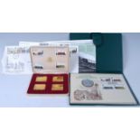 Great Britain, cased set of four 1975 gold plated sterling silver railway anniversary stamps,