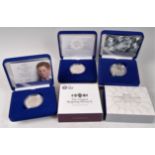 Five cased silver proof crowns, to include 2005 Prince Henry of Wales, 2006 80th Birthday,