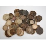 Mixed lot of British and world silver and copper coins and tokens,