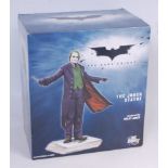 A DC Direct limited edition figurine titled...