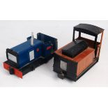 A pair of 32mm scale battery operated 0-4-0 locos, one finished in blue and named 'Jane', the