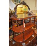 A mid Victorian mahogany mirrorback three tier whatnot, width 106cm