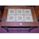 An Edwardian walnut and tile inset low occasional table, w.64.5cm
