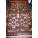 A Caucasian woollen rug, having four boxed reserves and flatweave kelim ends, 240 x 145cm