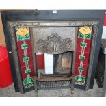 An Art Nouveau style cast iron and tiled inset fireplace, 98 x 97cm; together with a smaller white