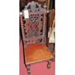 A Victorian mahogany pierced spiral turned and panelled seat hall chair