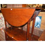 A George III mahogany drop leaf padfoot dining table having a gateleg action, width 106cm