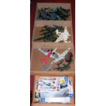A large quantity of mixed plastic kit built aircraft sold with original plans and empty boxes
