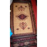 A Persian woollen saddle rug, having flatweave kelim ends, 190 x 76cm