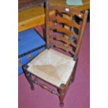 A set of six oak Lancashire ladderback rush seat dining chairs (4+2)