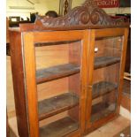 A late Victorian mahogany double door glazed dresser top, width 106cm