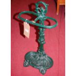 A green painted cast iron twin division stickstand