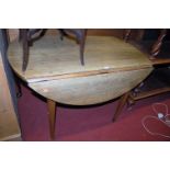 A 19th century provincial fruitwood drop flap supper table