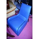 After Marc Newson - a contemporary royal blue leather upholstered low easy chair