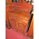 A William IV mahogany chiffonier having a three-quarter raised superstructure over twin frieze