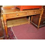 A Victorian mahogany three quarter gallery backed two drawer side table, width 114cm