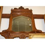 A circa 1900 carved oak wall mirror, 97 x 88cm