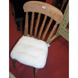 A set of six early 20th century elm seat and beech slat-back kitchen chairs