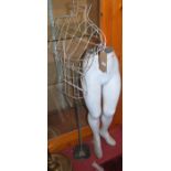 A white painted fibreglass shop display mannequin section; together with a 1960s chrome and wirework