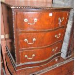 A mahogany serpentine front chest of three long drawers, having gadrooned edge, w.70cm