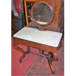 A mid 19th century Continental rosewood and satinwood strung circular swing mirror back wash