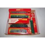 A quantity of loose and boxed Triang Hornby 00 gauge accessories to include R563 bogie two tier