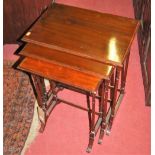 An early 20th century mahogany nest of three occasional tables, width of largest 51cm
