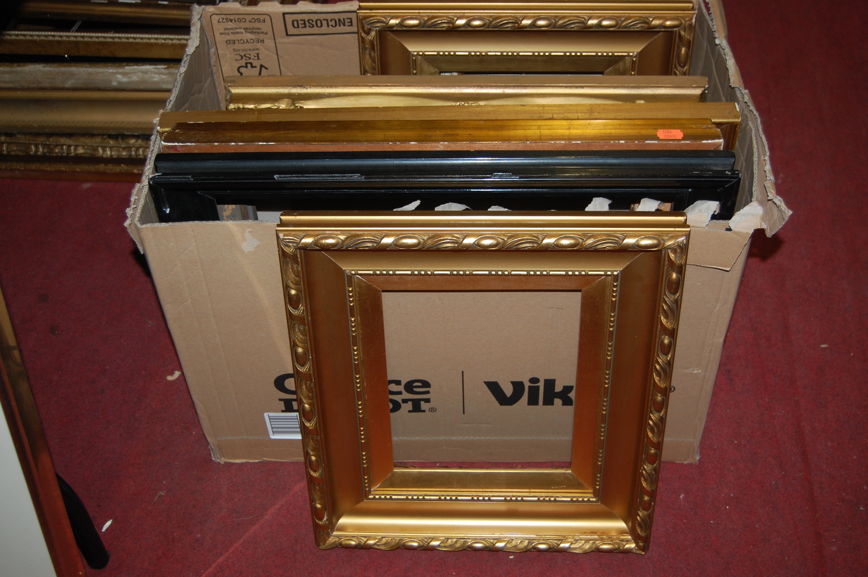 A box of assorted picture frames, largely being early 20th century and later gilt composition