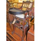 An Edwardian stained walnut child's highchair