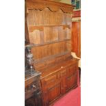 A contemporary joined oak narrow kitchen dresser, w.109cm