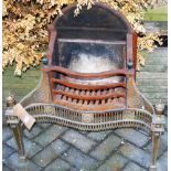 An Adam style cast iron and pierced brass fire basket, w.68cm