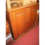 A late Victorian oak double door side cupboard, width 116cm