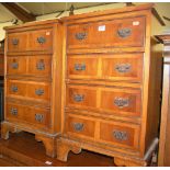 A pair of contemporary yew wood and crossbanded four drawer bedside chests, width 44cm