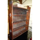 An early 20th century stained pine freestanding open bookshelf, width 90cm