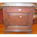 An 18th century oak table-top cupboard, fitted with numerous drawers, w.50cm