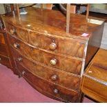 A mid 19th century flame mahogany bow front chest of two short over three long drawers, width 106cm
