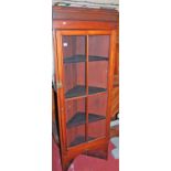 An Edwardian walnut corner cabinet, height 172cm