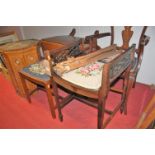 An artists easel; Edwardian inlaid mahogany elbow chairs; Edwardian dressing stool; walnut