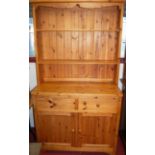 A modern pine kitchen dresser, w.111cm