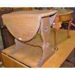 Occasional furniture, to include standard lamp, 1930s oak three-tier folding cake-stand, oak