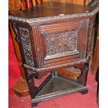 A circa 1900 low relief carved oak single door corner cupboard, width 76cm